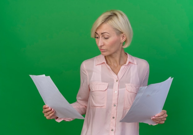 A split image. On one side, a person looking concerned while reviewing tax documents; on the other side, a group of people happily volunteering at a charity event. The image aims to visually represent the two key groups affected by the new IRS guidelines: individual donors and charitable organizations, respectively.