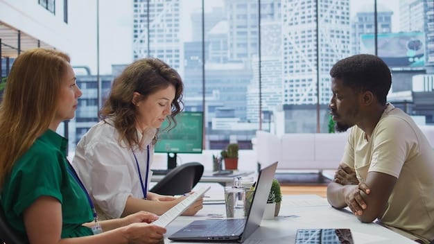 A diverse group of employees in a modern office setting, discussing employee benefits and investment options.